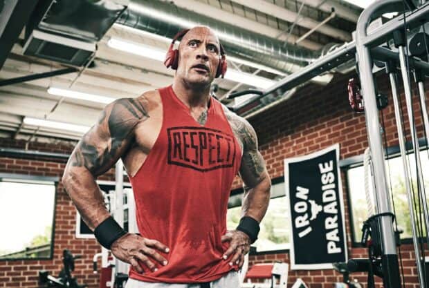 Dwayne Johnson focuses during an intense workout session in the gym, 2K Desktop Wallpaper
