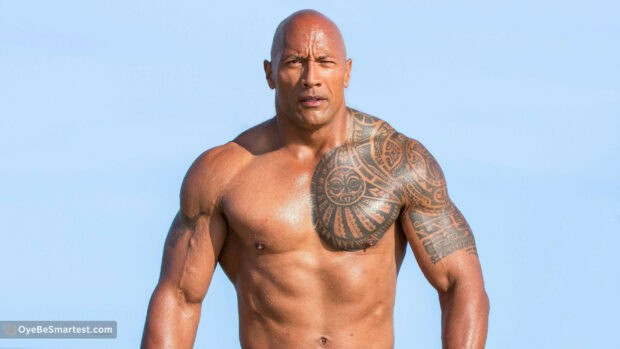 Dwayne Johnson displays his muscular body and tribal tattoos under bright sunlight, 2K Desktop Wallpaper