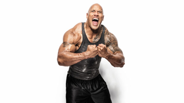 Dwayne Johnson shows intense strength and energy with clenched fists, 2K Desktop Wallpaper