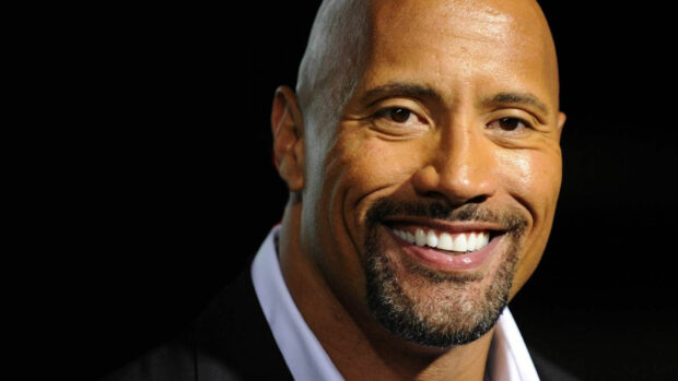 A close up of Dwayne Johnson smiling with a black background, HD Desktop Wallpaper