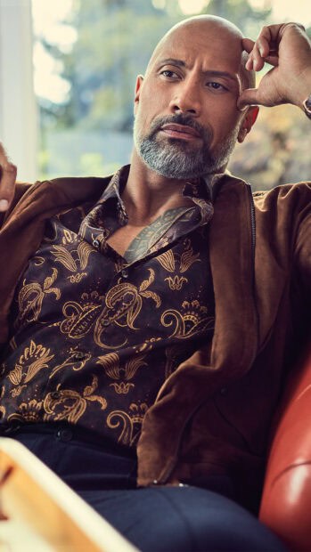 Dwayne Johnson wears a patterned shirt and jacket while sitting thoughtfully, HD Phone Wallpaper