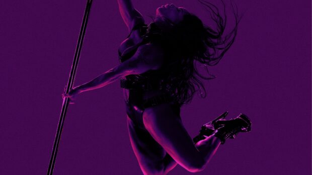 A dynamic silhouette of a woman performing pole dance with flowing hair, 4K Desktop Wallpaper