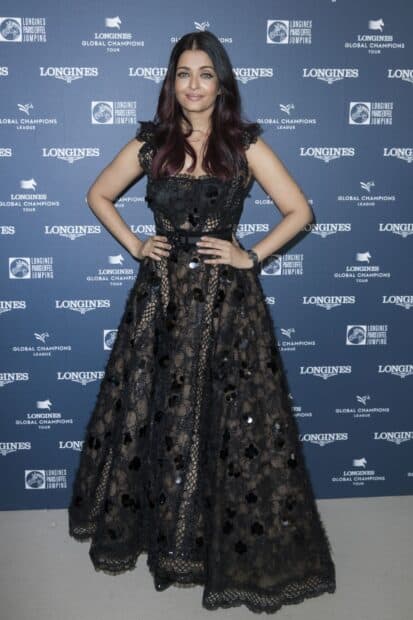Aishwarya Rai stands confidently wearing a black lace dress at a Longines event, HD Mobile Wallpaper