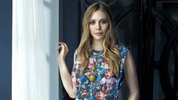 Elizabeth Olsen looks confident wearing a colorful floral dress and pendant necklace indoors, HD Desktop Wallpaper