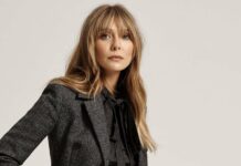 Elizabeth Olsen looks ahead with soft expression, 2K Desktop Wallpaper