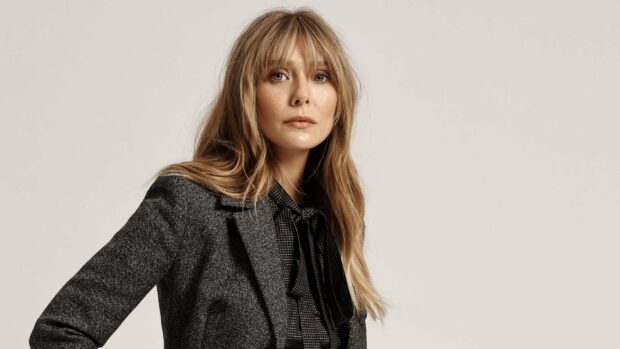 Elizabeth Olsen looks ahead with soft expression, 2K Desktop Wallpaper