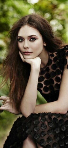 A close up of Elizabeth Olsen wearing a black floral dress outdoors, HD iPhone Wallpaper