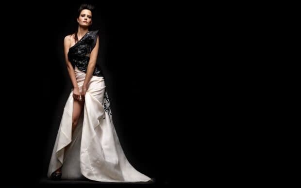 Eva Green Wallpapers captured in a dramatic pose with a flowing black and white dress, HD Desktop Wallpaper