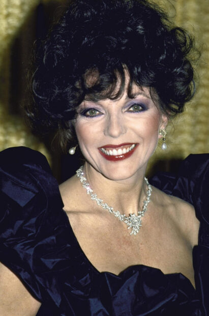 Joan Collins wallpapers featuring a smiling woman with curly black hair and jewelry, 2K Portrait Wallpaper