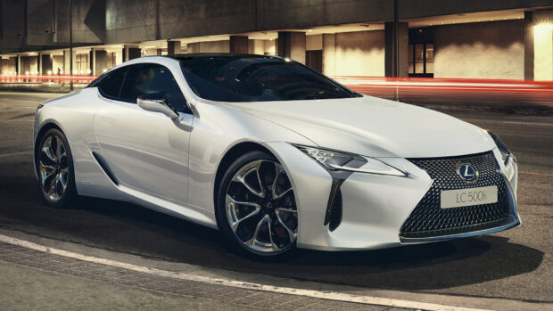 Lexus LC hybrid sports car parked on city street at night with light trails in the background, HD Desktop Wallpaper