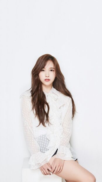 Nayeon wallpapers shows elegance in a white ruffled blouse sitting pose, HD Phone Wallpaper