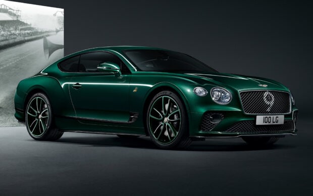 The Bentley Continental GT is shown in a sleek green finish highlighting its design details, HD Desktop Wallpaper