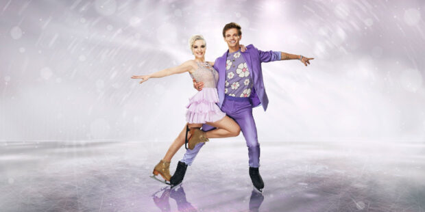 A couple is ice dancing in stylish costumes on a bright ice rink, 2K Desktop Wallpaper