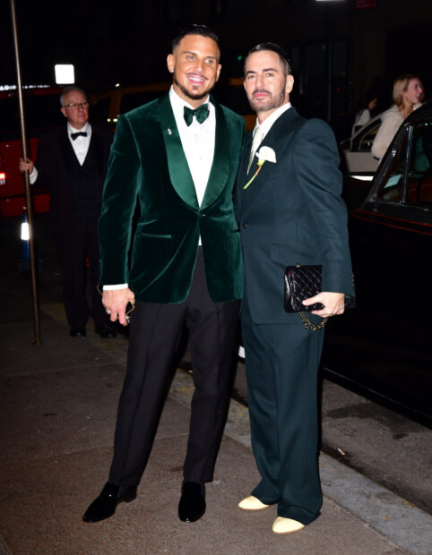 Two men posing together at a night event wearing formal suits, HD Desktop Wallpaper