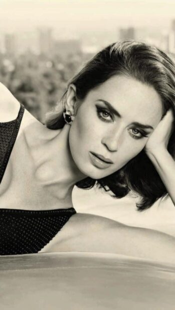A close up portrait of Emily Blunt with intense eye makeup and styled hair, HD Phone Wallpaper