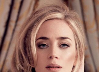 A close up of Emily Blunt wearing a ruffled blouse with soft lighting, HD Phone Wallpaper