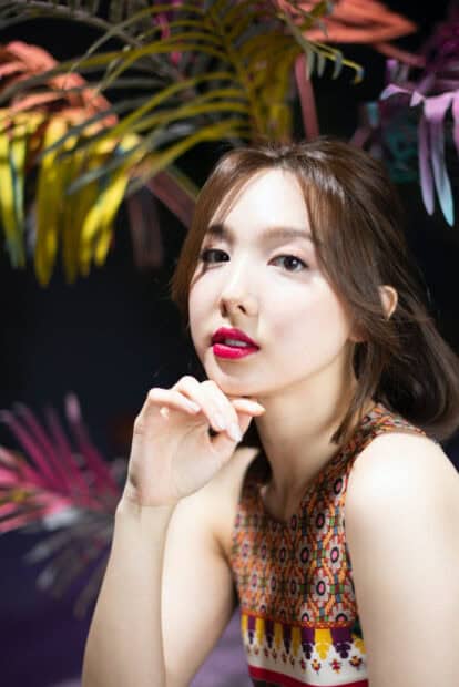 A close up portrait of Nayeon with vibrant colors and intricate patterns in the background, HD Mobile Wallpaper