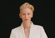 Tilda Swinton is wearing a white suit against a black background, HD Desktop Wallpaper