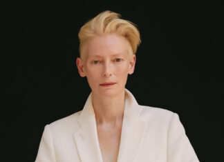 Tilda Swinton is wearing a white suit against a black background, HD Desktop Wallpaper