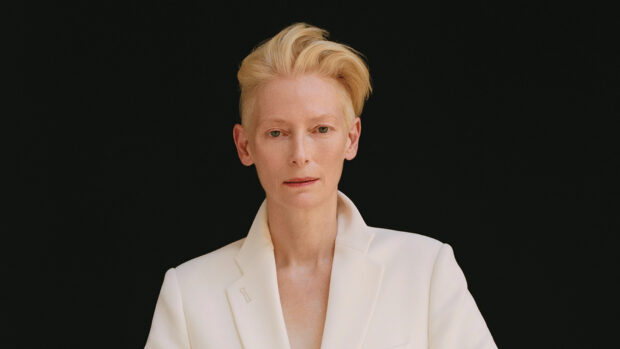 Tilda Swinton is wearing a white suit against a black background, HD Desktop Wallpaper