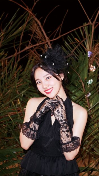 Nayeon Wallpapers shows an elegant smile wearing a black lace gloves dress with a decorative headpiece, 4K Phone Wallpaper