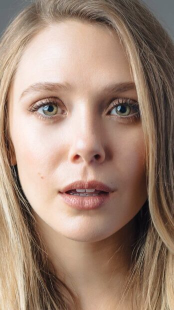 A close up of Elizabeth Olsen showing her green eyes and natural makeup, HD Phone Wallpaper