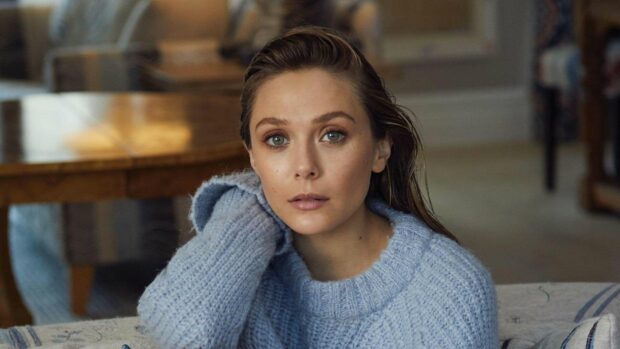 Elizabeth Olsen is wearing a blue sweater sitting indoors, HD Desktop Wallpaper