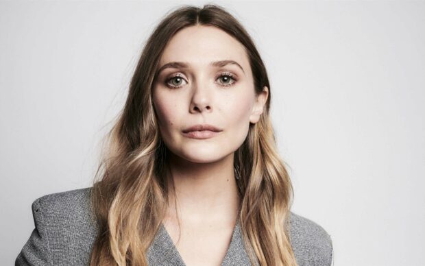 Elizabeth Olsen looks directly at the camera with a neutral expression, 2K Desktop Wallpaper