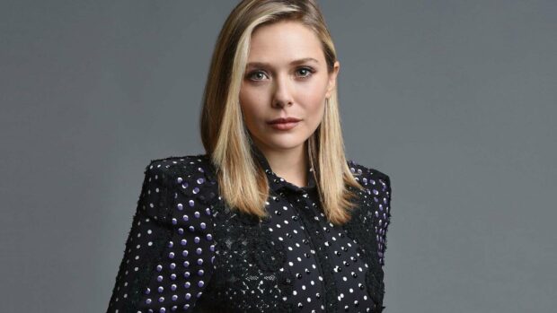 Elizabeth Olsen looks confidently at the camera wearing a black patterned jacket, HD Desktop Wallpaper