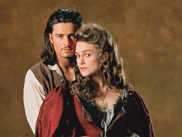 Elizabeth Swann and Will Turner from Pirates of the Caribbean posing in period costumes, 2K Desktop Wallpaper