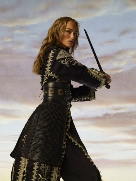 Elizabeth Swann from Pirates of the Caribbean is shown holding a sword ready for battle, 2K Mobile Wallpaper