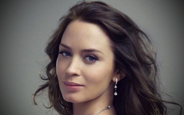 Emily Blunt looks directly at the camera with a neutral expression, HD Desktop Wallpaper