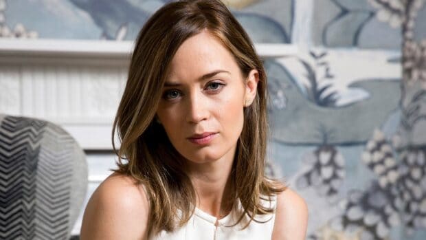 Emily Blunt looks thoughtfully in a close up portrait with soft lighting, HD Desktop Wallpaper