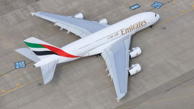 An Emirates Airbus A380 rests on the airport runway ready for departure, HD Desktop Wallpaper