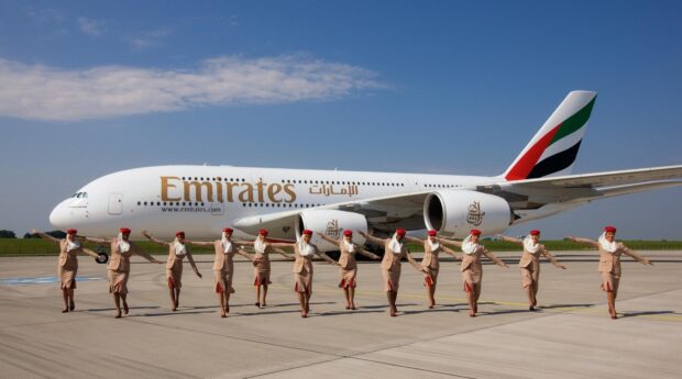 Emirates flight attendants pose near an Airbus A380 on the runway, HD Desktop Wallpaper