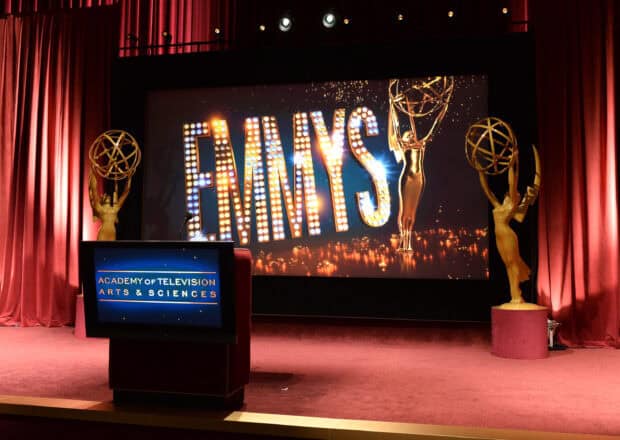 The Emmy Awards stage features golden statues and a large illuminated sign, 2K Desktop Wallpaper