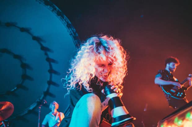 The Paramore lead singer passionately performs with the band on stage, HD Desktop Wallpaper