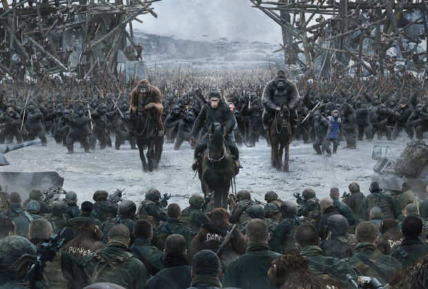Apes and soldiers face off in a snowy battlefield, 2K Desktop Wallpaper