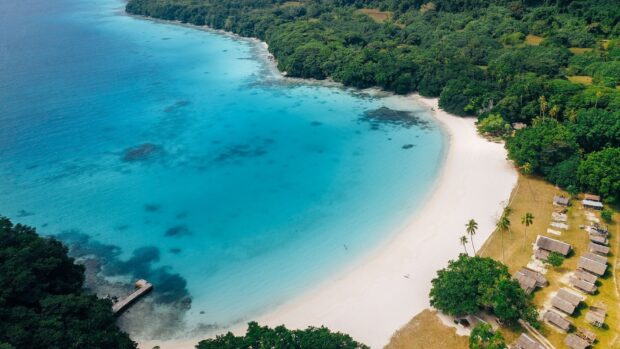 A clear blue ocean meets the white sandy beach in Espiritu Santo Vanuatu, HD Desktop Wallpaper