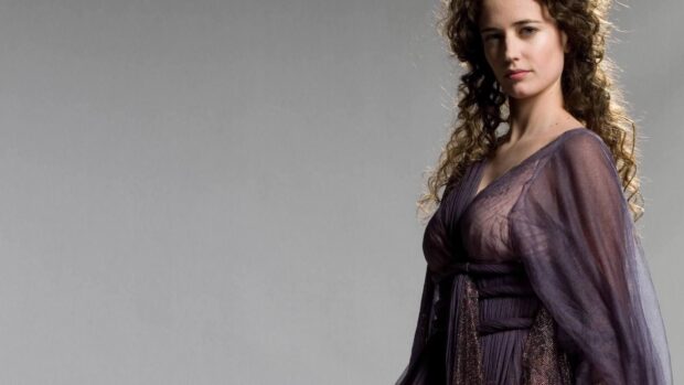 Eva Green wears a sheer purple dress with curly hair against a gray background, HD Desktop Wallpaper