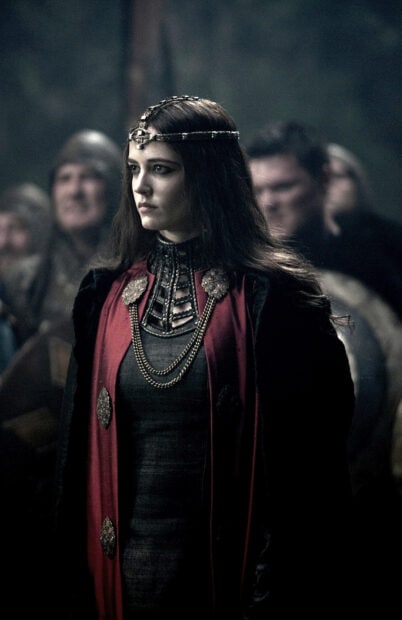 Eva Green wears medieval royal attire with a solemn expression during a historic gathering, HD Phone Wallpaper