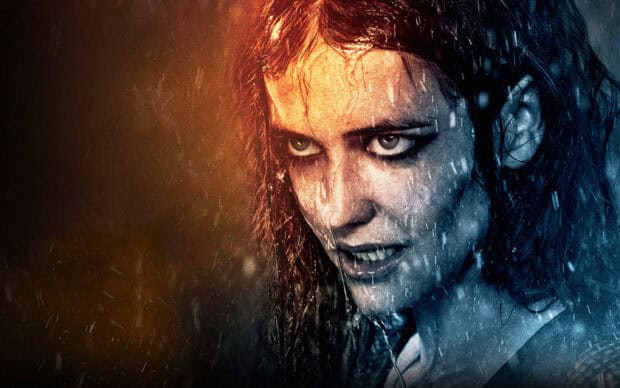 Eva Green displays a fierce expression with rain pouring down her face, 2K Desktop Wallpaper
