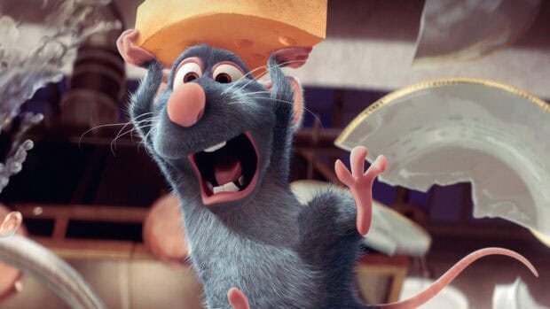 A joyful Pixar rat is holding a large piece of cheese in a kitchen, 4K Desktop Wallpaper