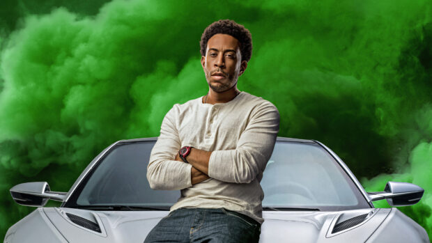 A man stands confidently in front of a sleek car with green smoke surrounding, HD Desktop Wallpaper
