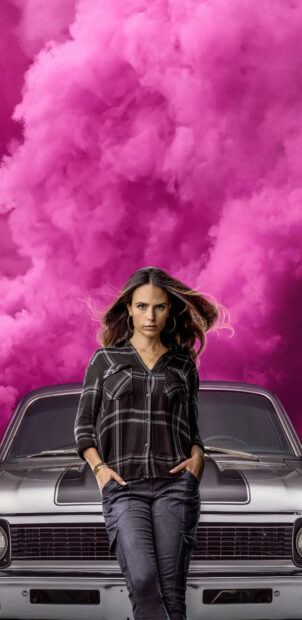 A confident woman stands in front of a vintage car with pink smoke behind her in F9 Wallpapers, HD Phone Wallpaper