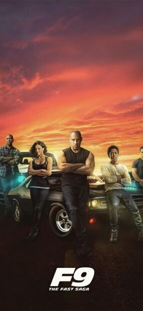 The F9 movie cast stands confidently in front of a car under a vibrant sunset sky, F9 Wallpapers, HD Phone Wallpaper