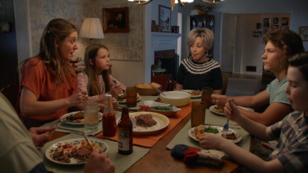 A family is sharing a meal together in a cozy dining room from Young Sheldon Tv Series Wallpapers, HD Desktop Wallpaper