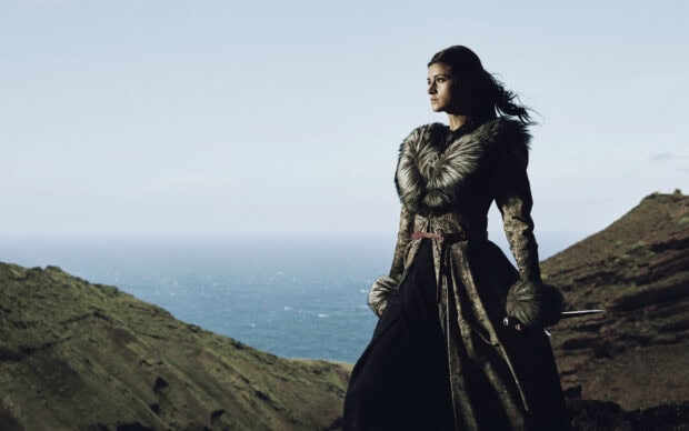 A fearless warrior stands on a cliff overlooking the sea in The Witcher Tv Series Wallpapers, HD Desktop Wallpaper