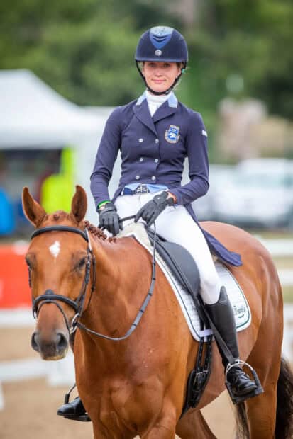 A female rider wearing formal attire is participating in eventing wallpapers with a chestnut horse, 2K Desktop Wallpaper