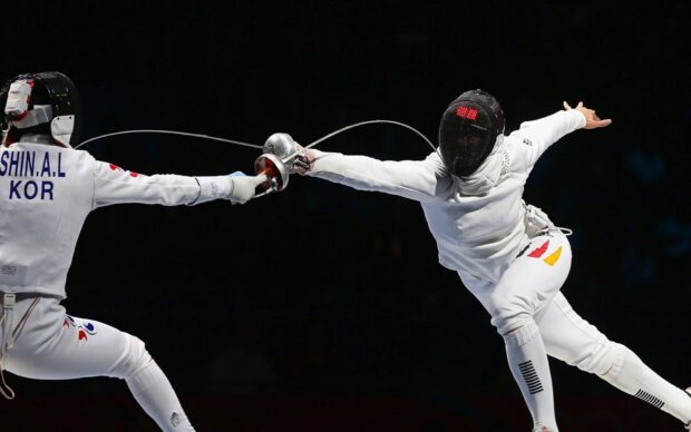 Two fencers compete wearing white gear and masks in a fencing match, HD Desktop Wallpaper